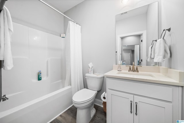 full bathroom with shower / bath combination with curtain, toilet, vanity, and wood-type flooring