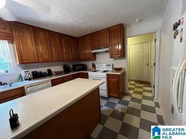 bathroom featuring tile flooring and vanity