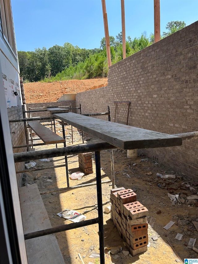 view of patio with an outdoor structure