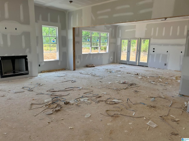 unfurnished living room featuring a fireplace