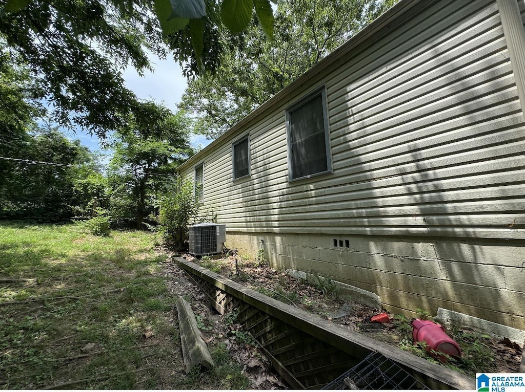 view of property exterior with cooling unit