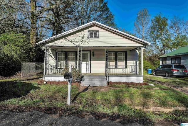 bungalow-style home with a porch