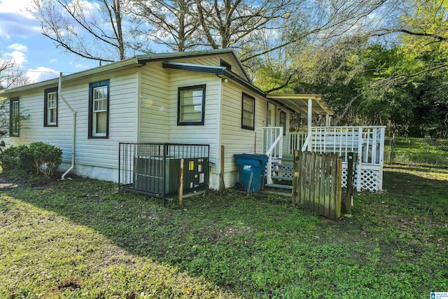 view of home's exterior featuring a lawn