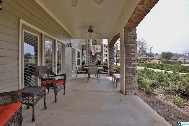 view of patio featuring ceiling fan and outdoor dining space