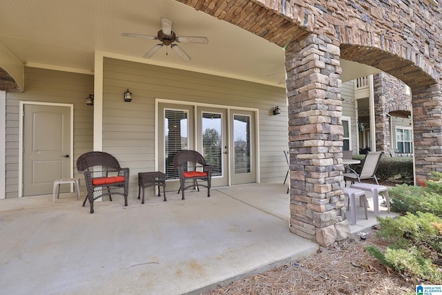 view of patio with ceiling fan and french doors