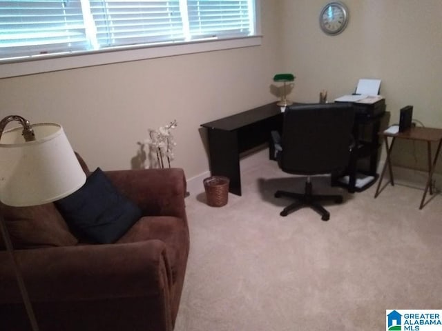 office space with carpet floors and baseboards