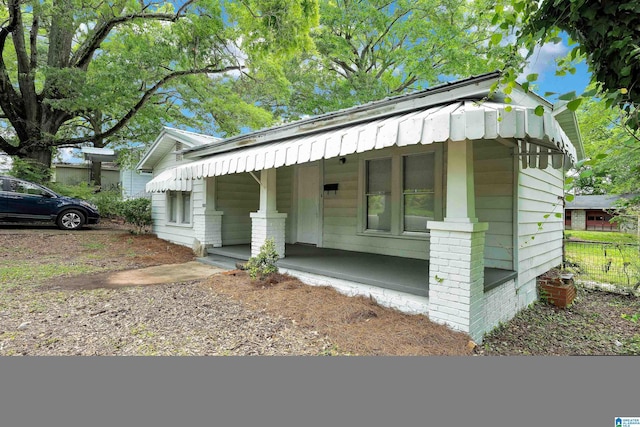 bungalow-style home with covered porch