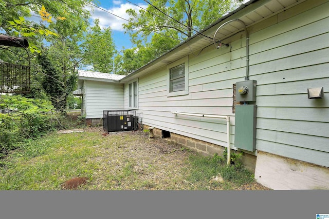 view of home's exterior with cooling unit