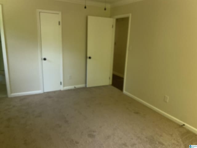 unfurnished bedroom with carpet