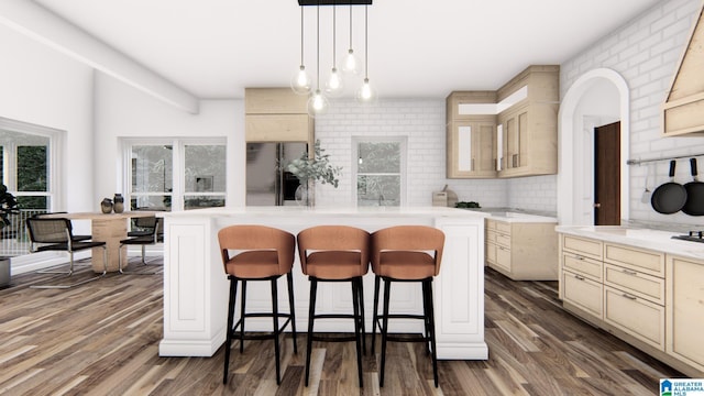 kitchen with dark hardwood / wood-style floors, decorative light fixtures, a breakfast bar, a kitchen island, and backsplash