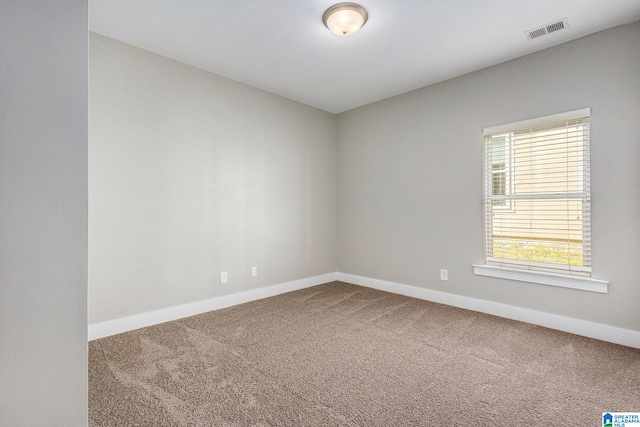 unfurnished room with carpet