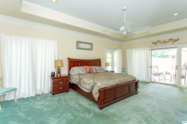 bedroom with access to exterior, ceiling fan, a raised ceiling, light colored carpet, and ornamental molding