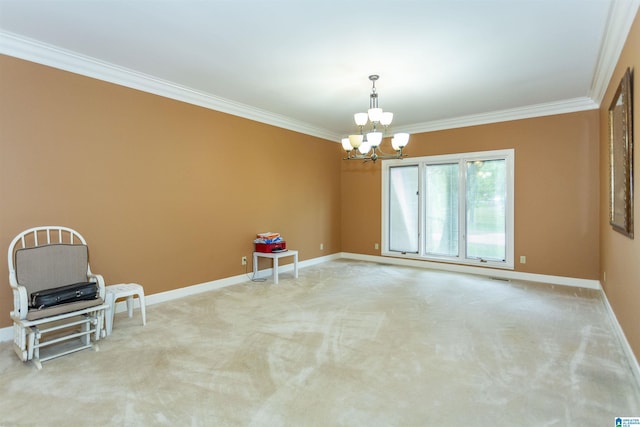 carpeted empty room featuring crown molding and an inviting chandelier