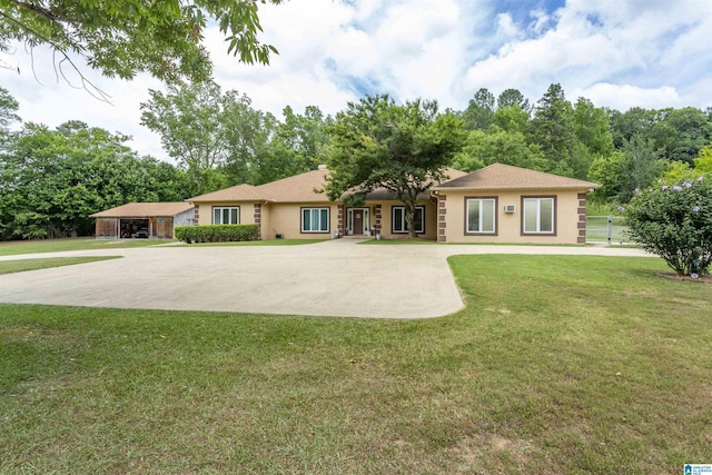 single story home featuring a front lawn