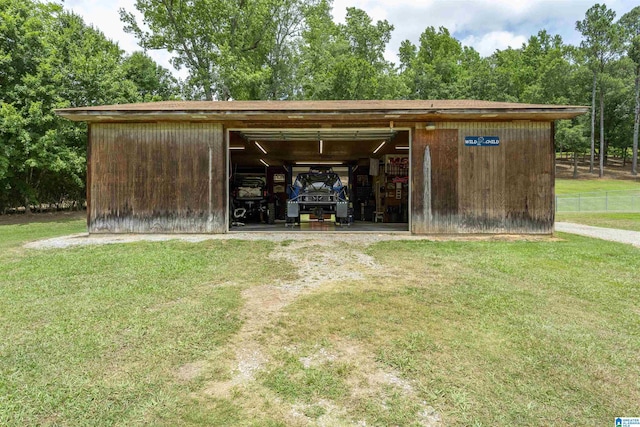 view of outdoor structure with a yard