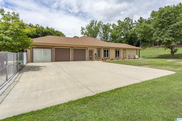 single story home with a front lawn and a garage