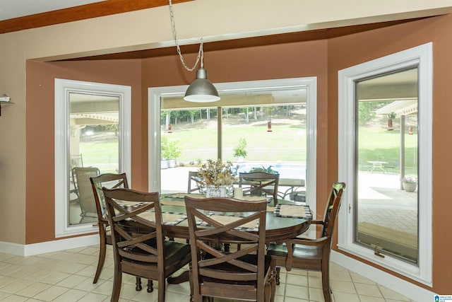 dining space with light tile patterned floors