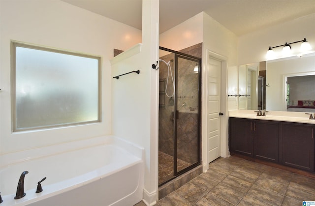 bathroom with vanity and plus walk in shower