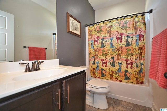 full bathroom with tile patterned flooring, vanity, toilet, and shower / bath combo with shower curtain