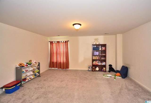 recreation room featuring carpet flooring