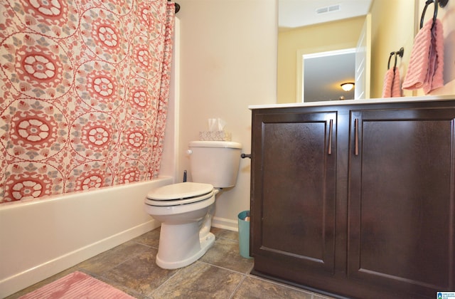 bathroom featuring shower / bath combination with curtain and toilet