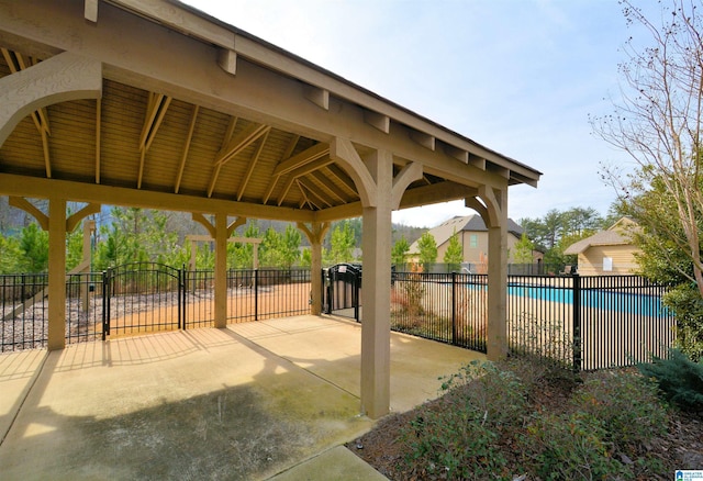 view of home's community featuring a gazebo and a pool