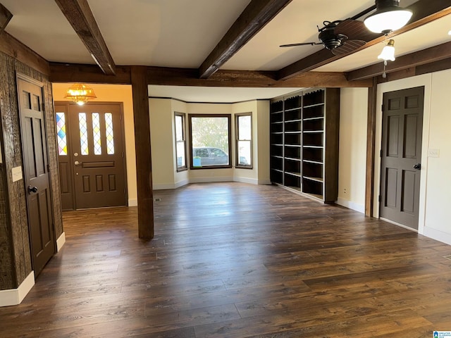 foyer entrance with beamed ceiling, dark hardwood / wood-style floors, and ceiling fan