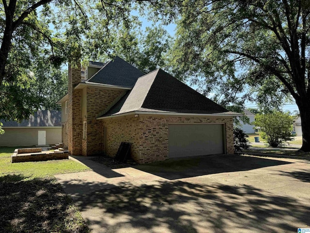 view of home's exterior with a garage