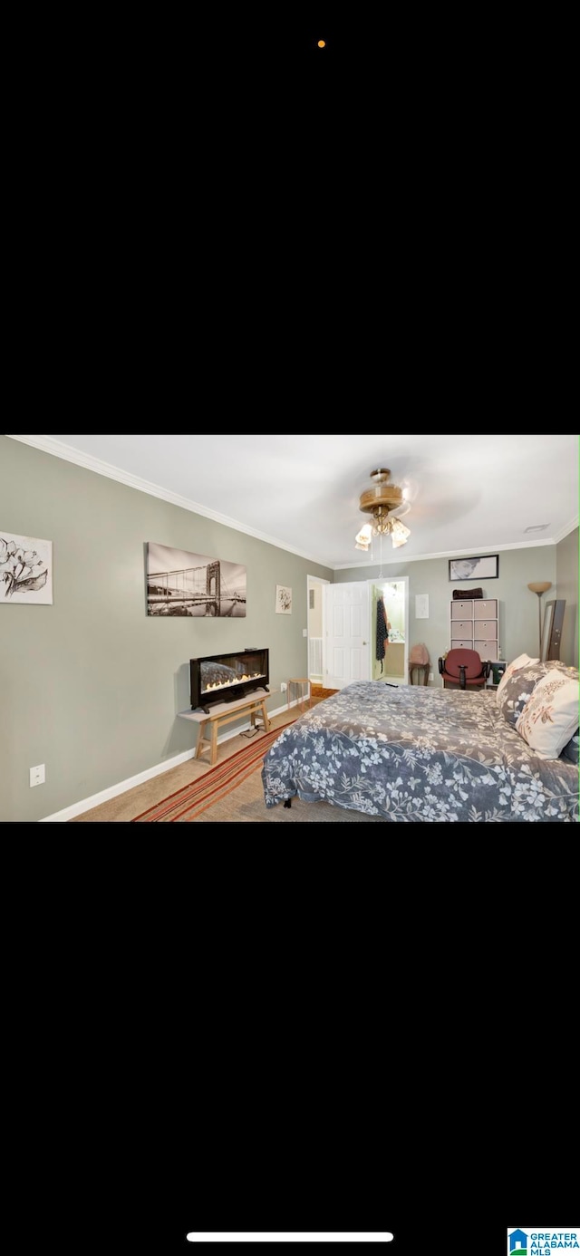 bedroom featuring wood-type flooring, ceiling fan, and crown molding