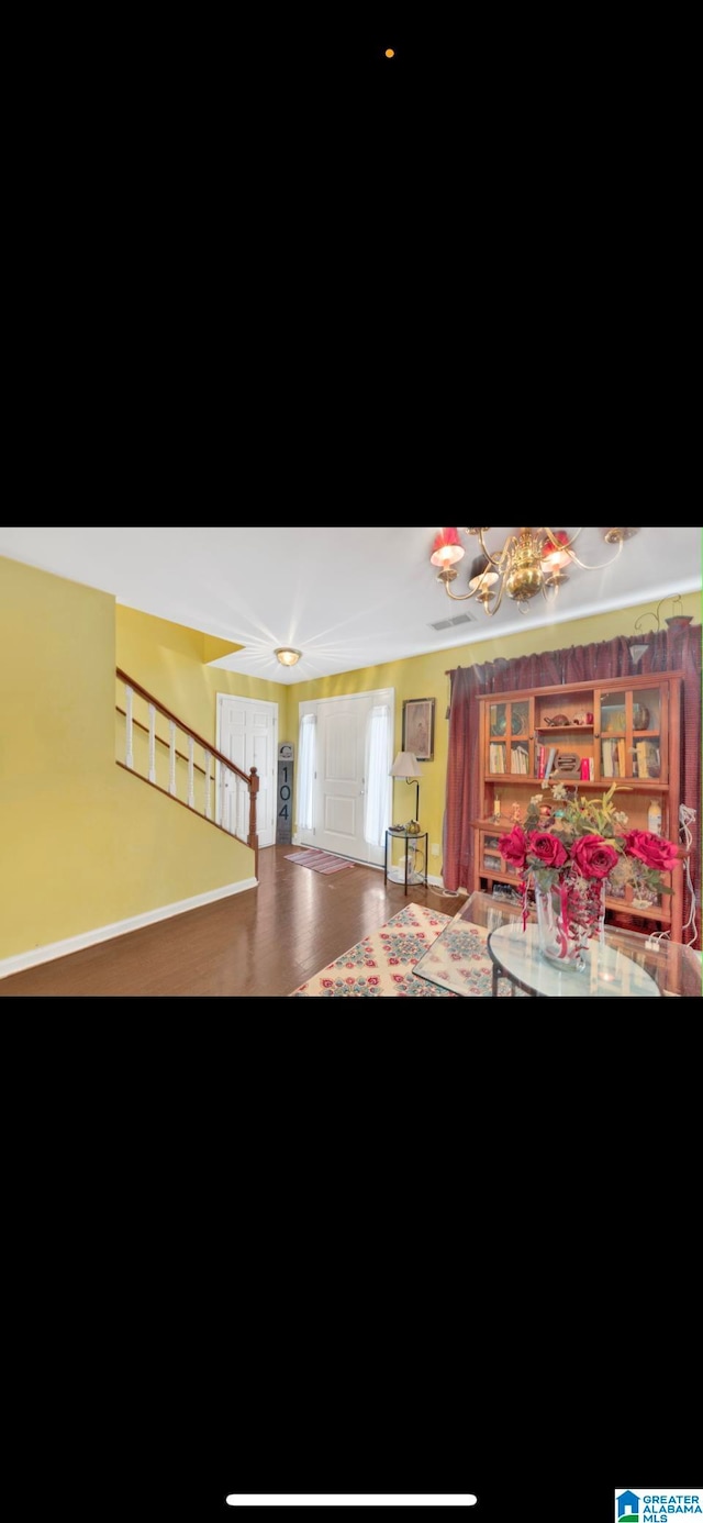 interior space with hardwood / wood-style floors