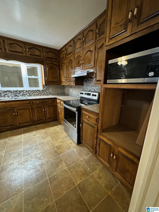 kitchen with sink and electric stove