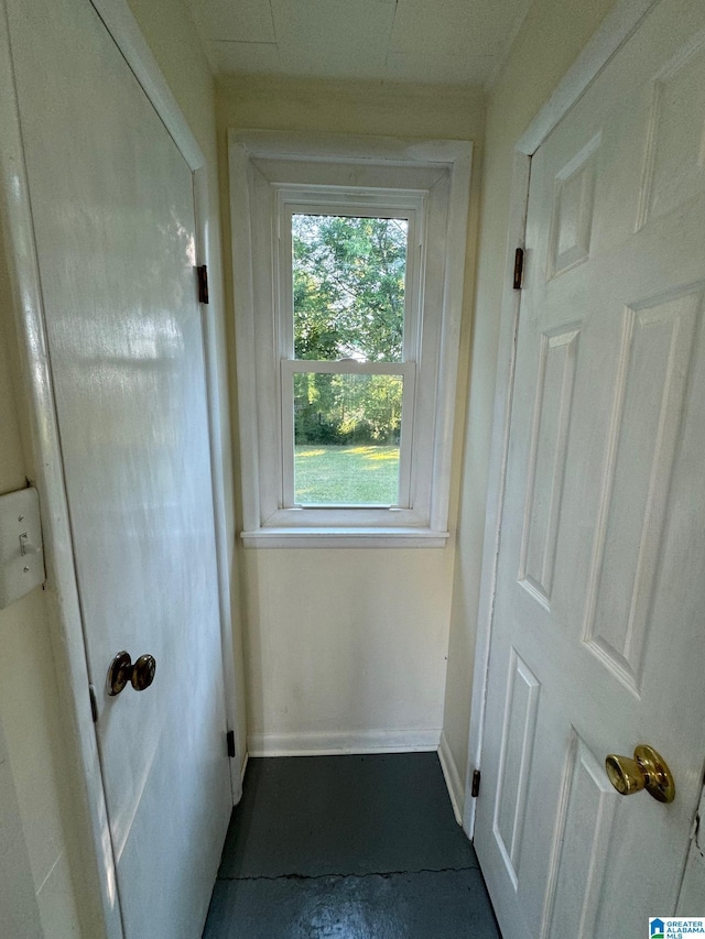 doorway with concrete floors