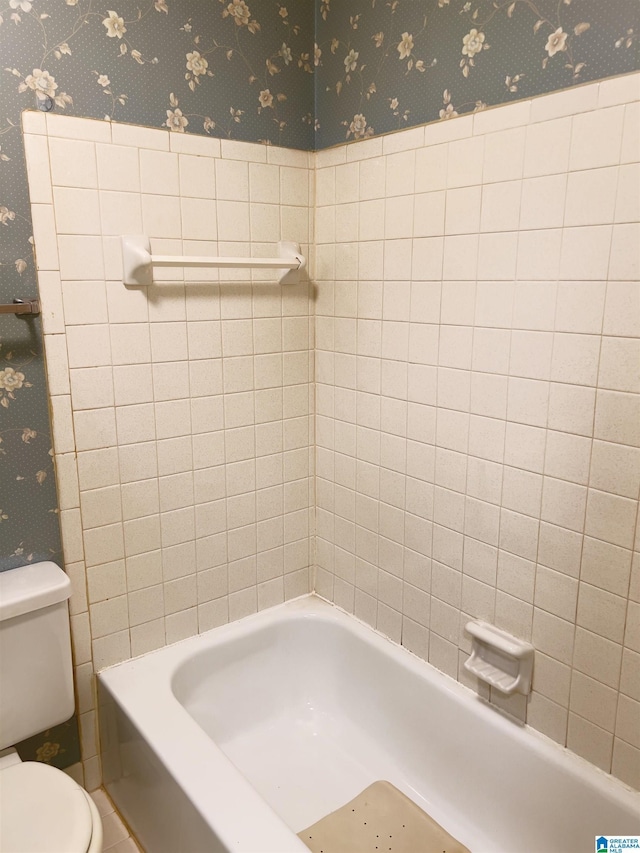 bathroom with tile patterned floors, vanity, and toilet