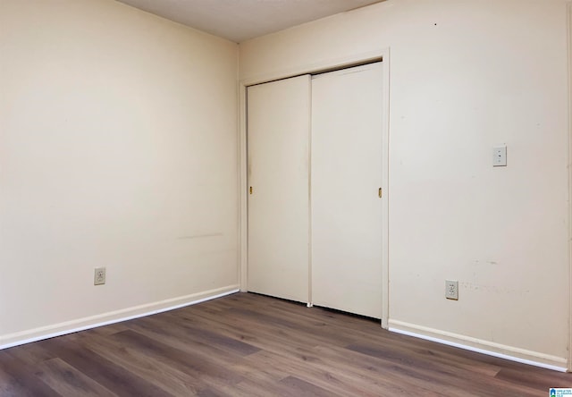 unfurnished bedroom with wood-type flooring