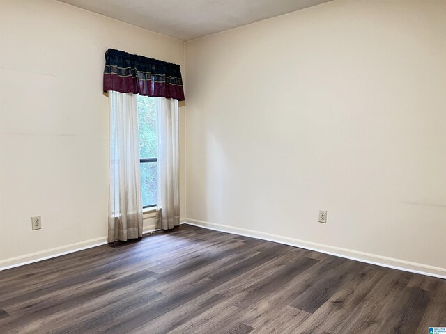 1047 Ivy Hills Cir Unit 1047, Hoover, AL 35216 - empty room featuring dark wood-style flooring and baseboards
