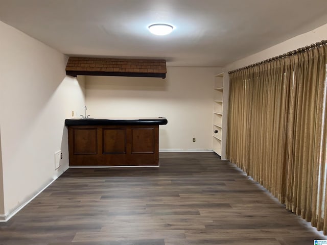 bar featuring dark hardwood / wood-style floors