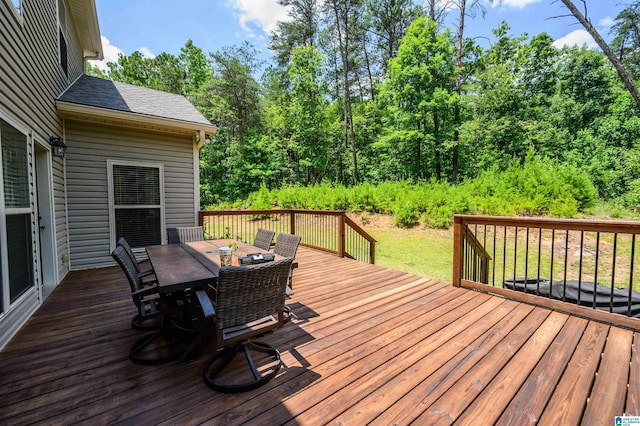 deck featuring a yard