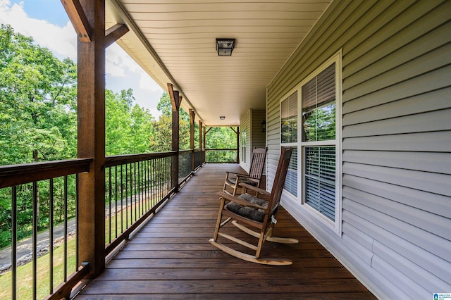 wooden deck featuring covered porch