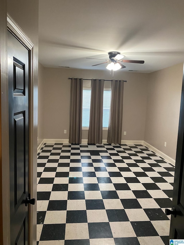 unfurnished room featuring ceiling fan