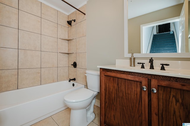 full bathroom with vanity, tile patterned flooring, tiled shower / bath combo, and toilet