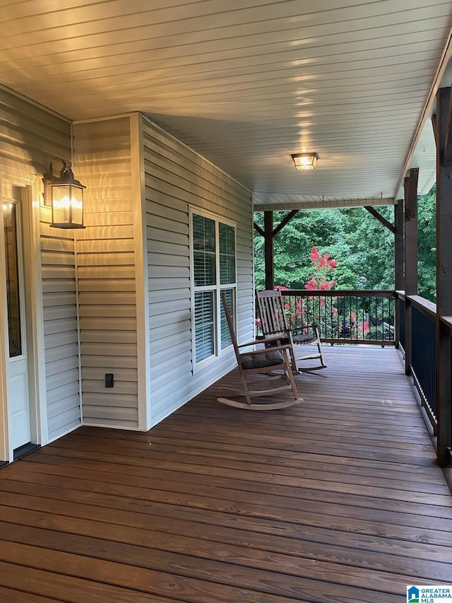 wooden terrace with covered porch