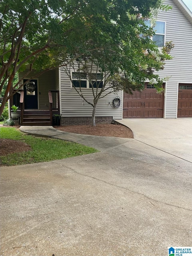 exterior space with a garage