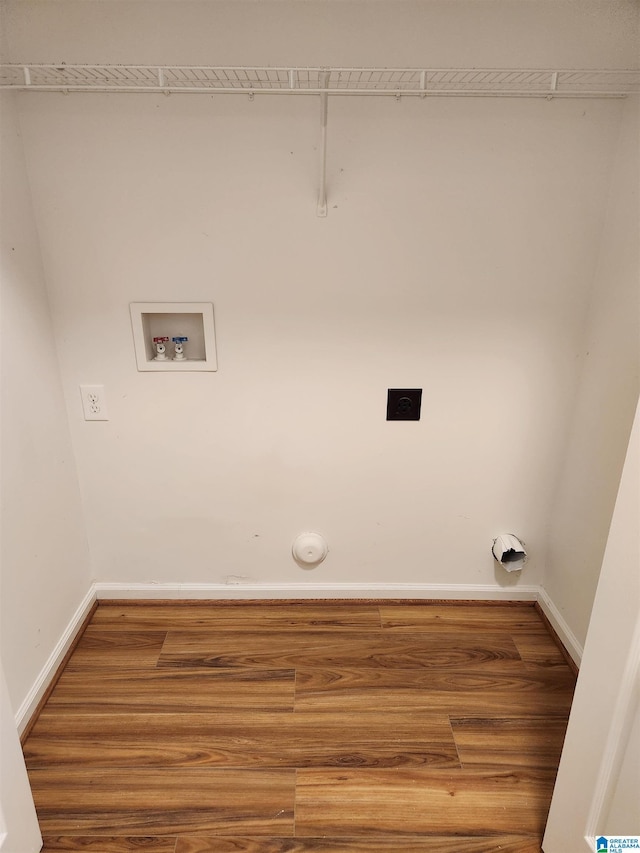 laundry room featuring washer hookup, laundry area, hookup for an electric dryer, and wood finished floors