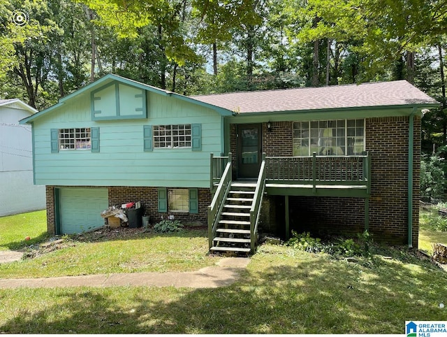 view of front facade featuring a garage and a front lawn