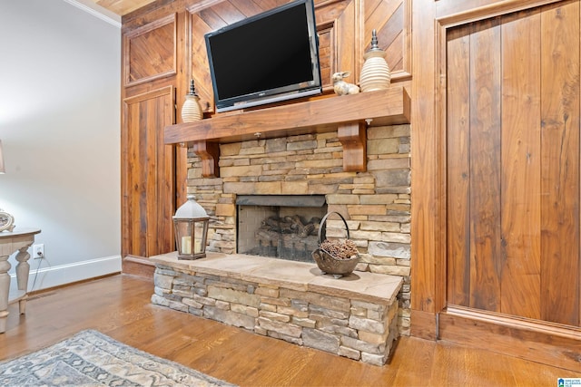 dining area featuring beam ceiling, ornamental molding, dark wood-type flooring, and coffered ceiling