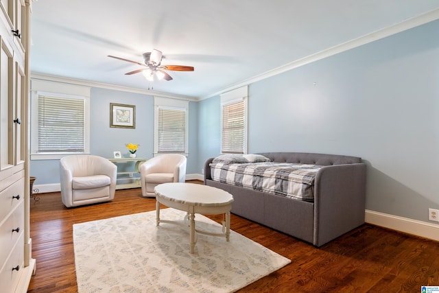 bedroom with dark hardwood / wood-style floors and ornamental molding