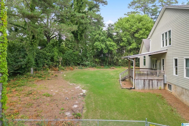 deck featuring a yard