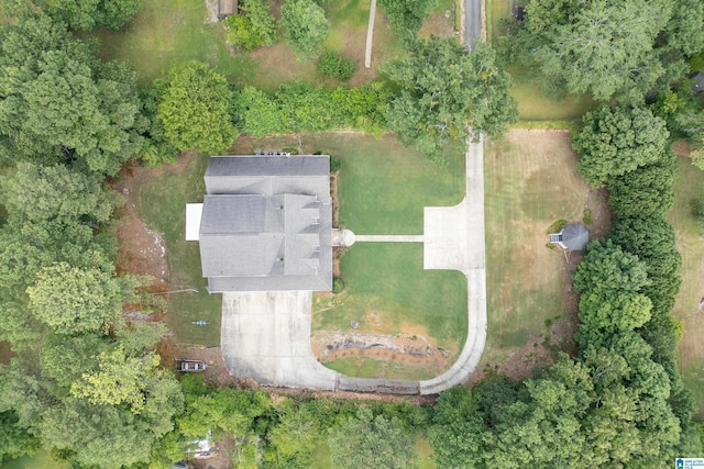 exterior space featuring a front yard, a porch, and a garage