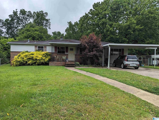 view of front of home featuring a carport, covered porch, and a front yard