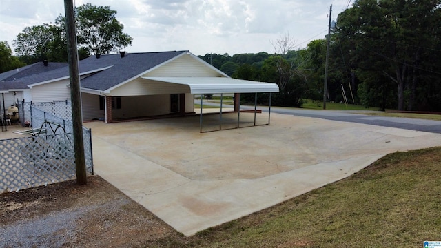 view of patio featuring a carport